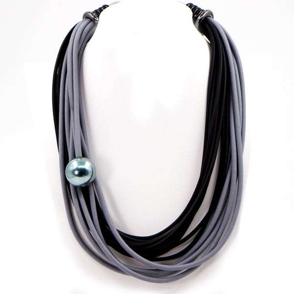 Black and grey rubber multistrand necklace with grey pearl d