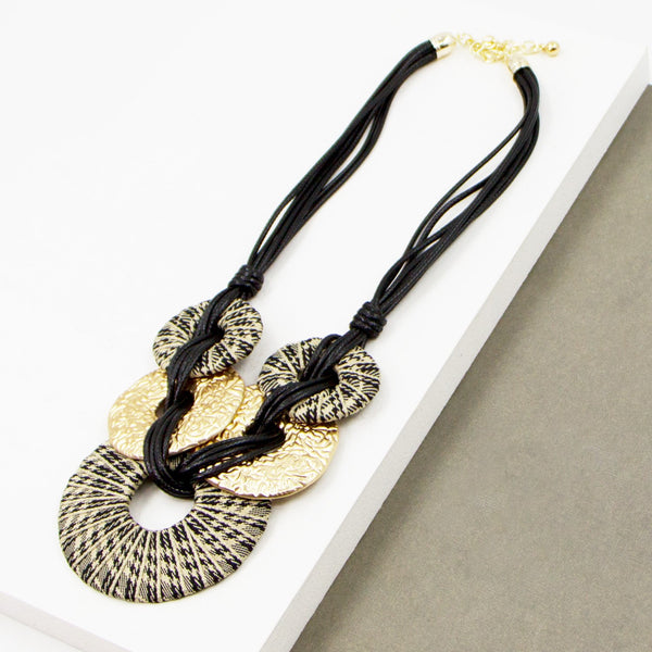 Open fabric covered circles and metal discs statement necklace