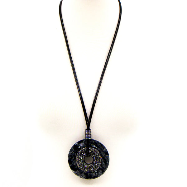 Circle pendant with gun crystal element on long cord necklace
