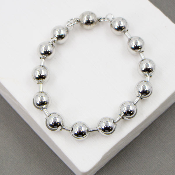 Substantial ball bracelet with magnetic clasp