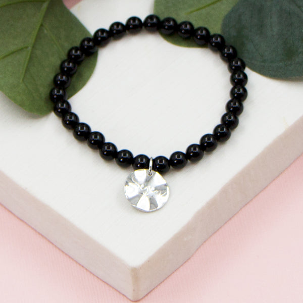 Black onyx semi precious bracelets with sterling silver tag