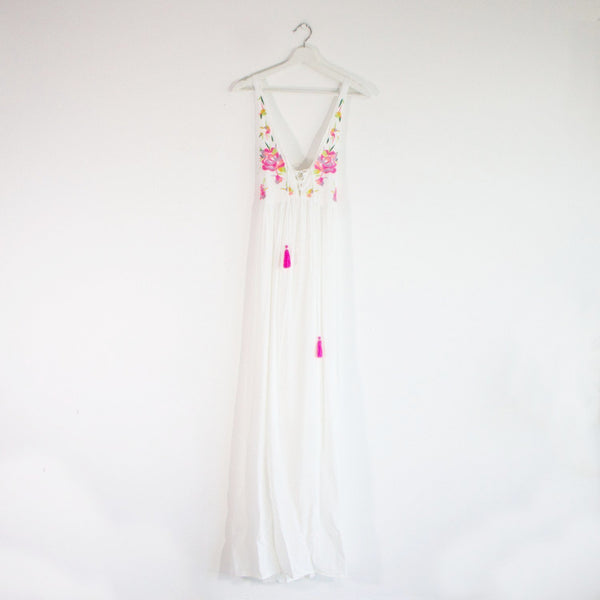 V neck maxi dress with a crossover back and neon floral embroidery