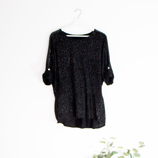 Jersey animal print batwing top with sequin detail and 3/4 sleeves
