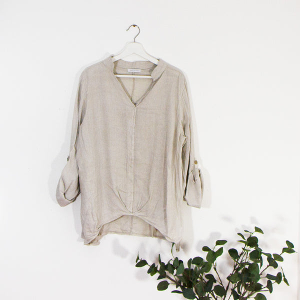Classic linen shirt top with inverted neckline and puckering detail on hem