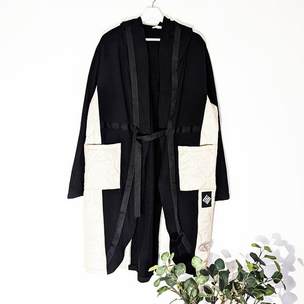 Hooded Jersey coat with padded sections and pockets in addition to ribbon elements (M)