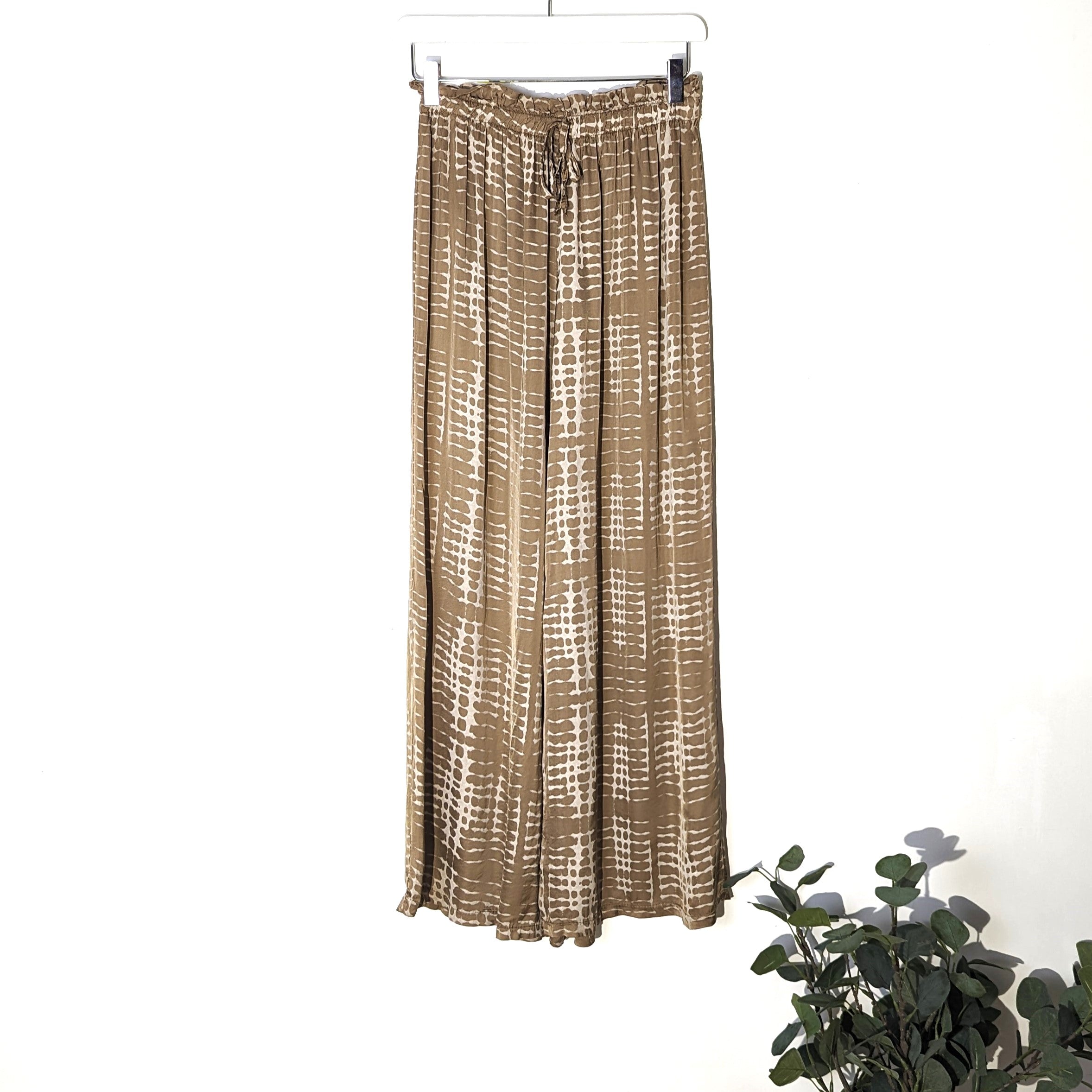 Straight led satin trousers with pockets, elasticated waist and stylis ...