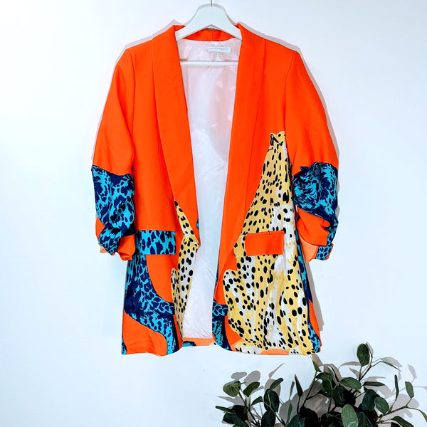 Blazer with ruched arms and leaping cheetah print
