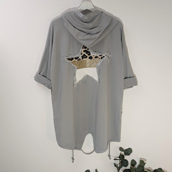 Multi fabric raw edge star backed hoodie with silver trim and pockets