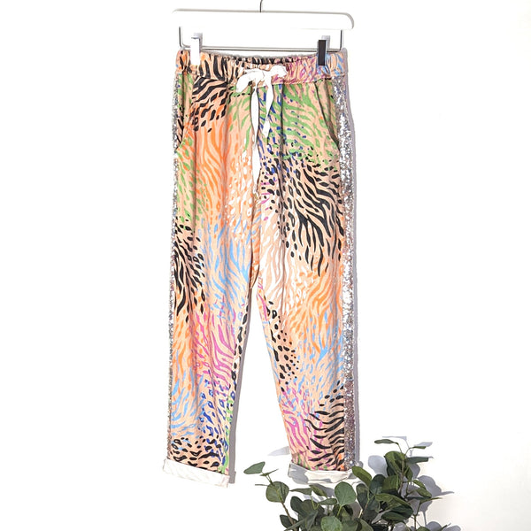 Colour animal print stretchy trousers withy sequin element inside seam and pockets