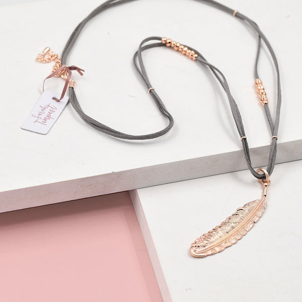 Feather pendant grey suede long necklace