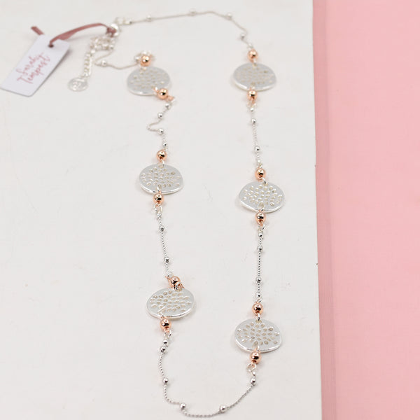 Long rope style necklace with rose gold tree of life symbols