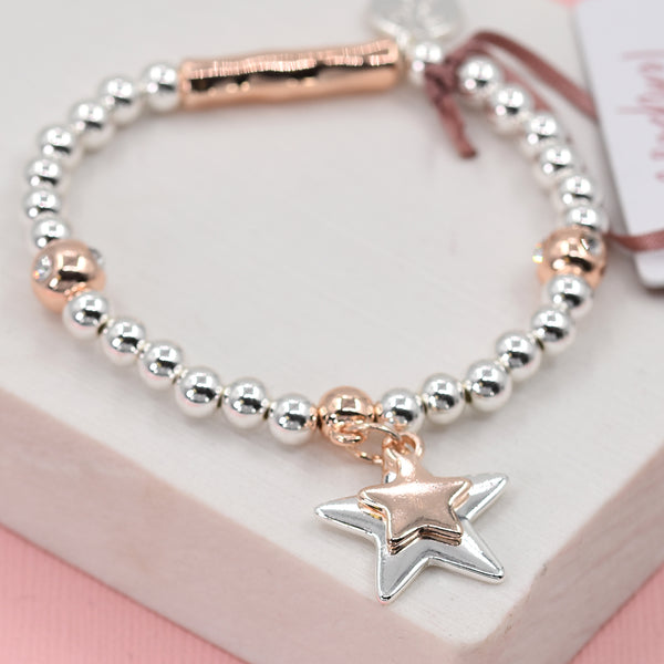 Beaded bracelet with star hanging charms