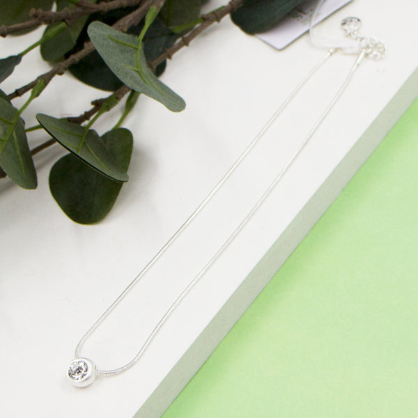 Crystal pendant on short snake chain necklace