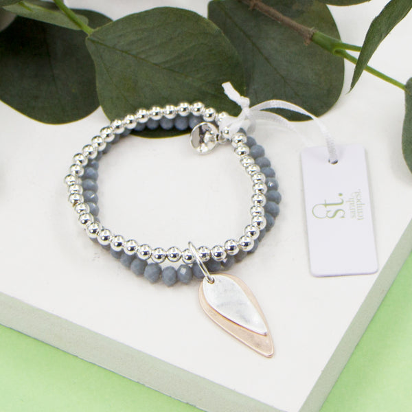 Grey agate beaded stretchy bracelet with elongated oval shape charm