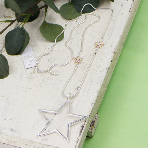 Large open star pendant on long snake chain necklace