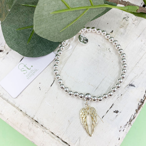 Angel wings charm on stretchy beaded bracelet