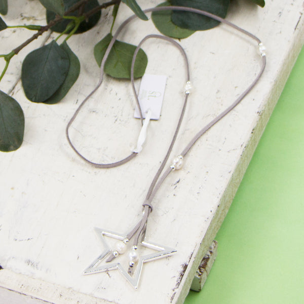 Long grey suede necklace with open star pendant and fresh water pearls