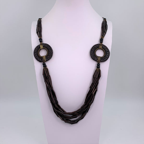 Luxury multistrand wood beaded necklace with woven ring elements