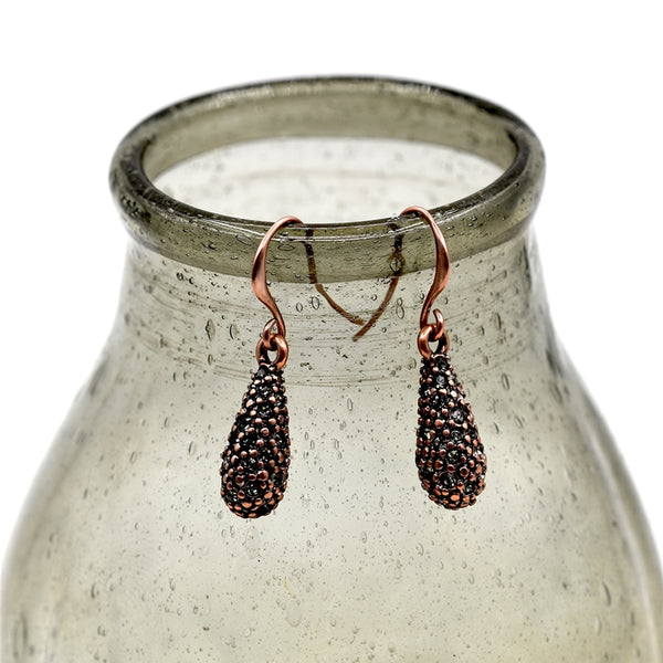 Full teardrop style drop earrings with all over crystals