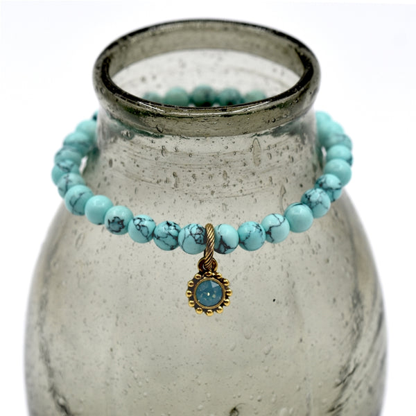 Marble effect beaded braclet with delicate opal stone drop