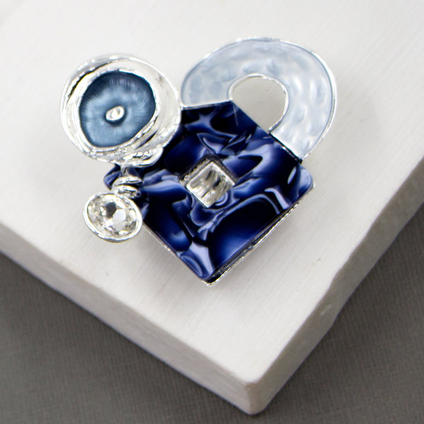 Contemporary multi shape magnetic brooch with resin