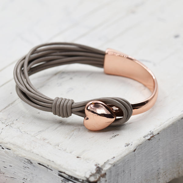 Leather bangle with heart feature clasp
