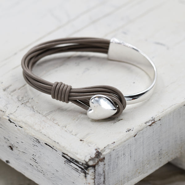 Leather bangle with heart feature clasp