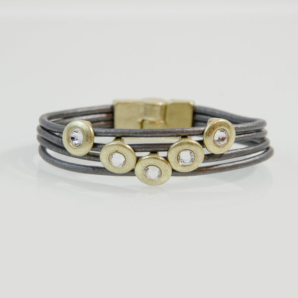 Four strand leather bracelet with matt circles and crystal