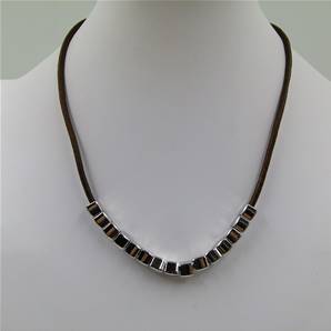 Single strand khaki necklace with rhodium square nuggets