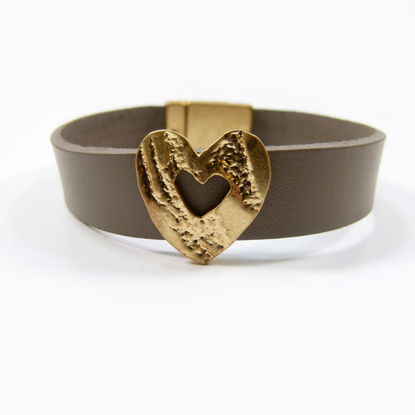 Contemporary cutout heart on leather strap