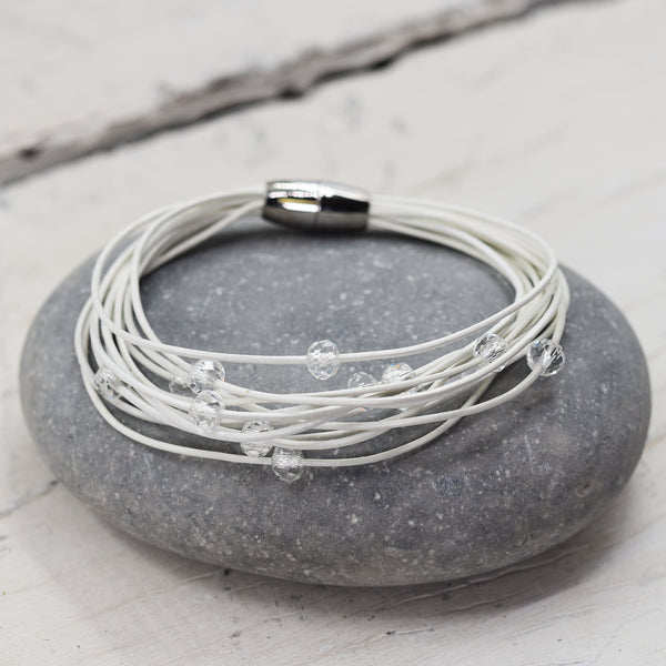 Multistrand leather bracelet interspaced with cut glass