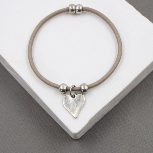 Flat heart pendant on leather magnetic bracelet
