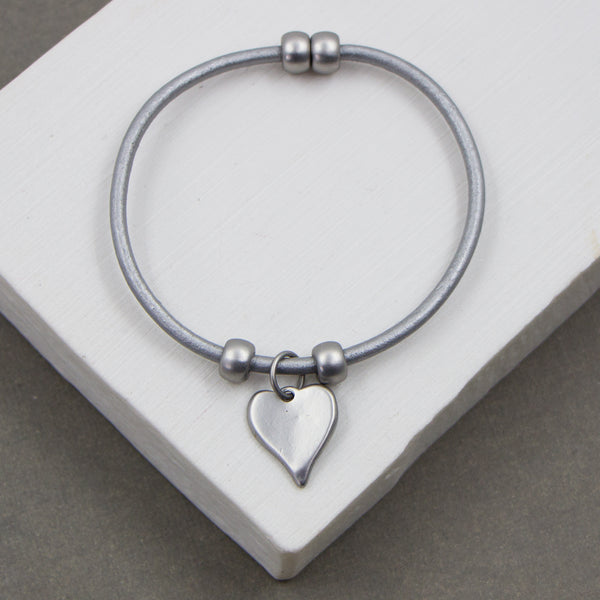 Flat heart pendant on leather magnetic bracelet