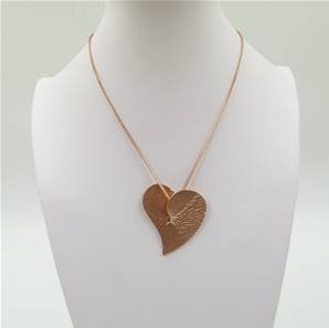 Irregular finish heart on short leather necklace