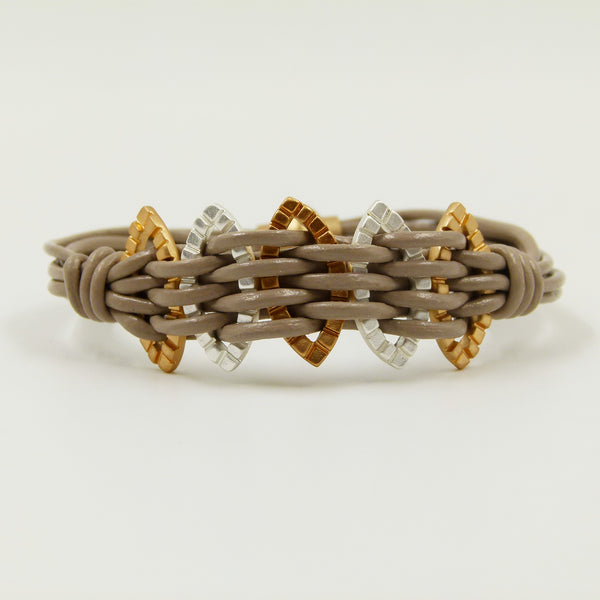 Multistrand interlinked leather bracelet with magnetic clasp