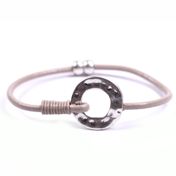 Simple circle detail on single cord leather bracelet