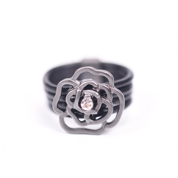 Cut out flower with crystal on leather ring