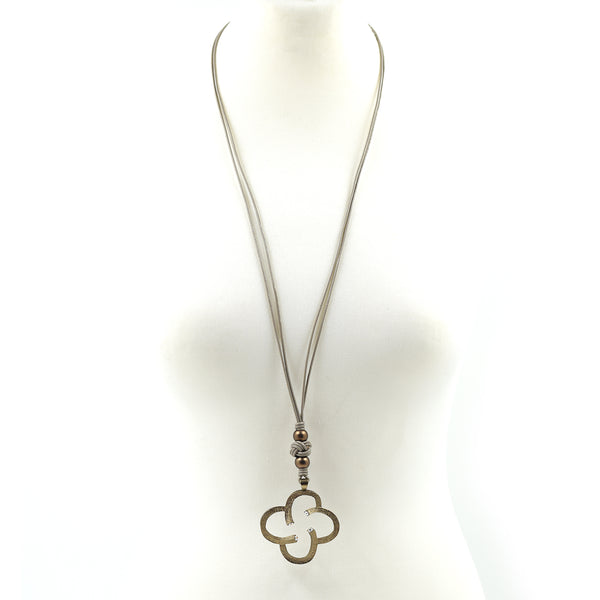 Contemporary cutout flower pendant on long leather necklace