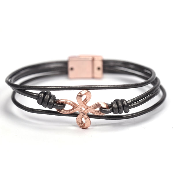 Infinity style detail on multi leather bracelet