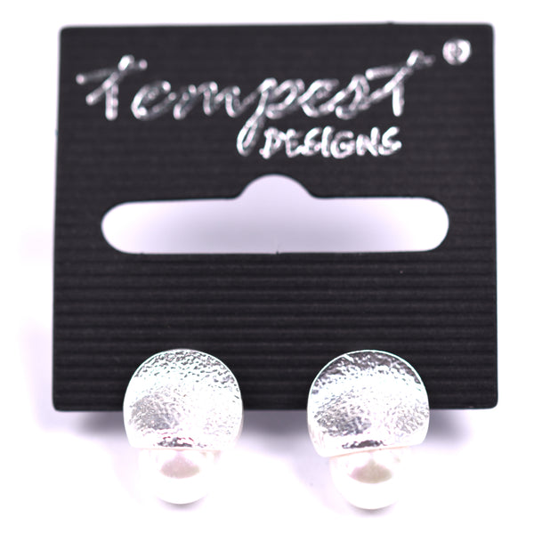 Stud earrings featuring a single pearl with silver surround