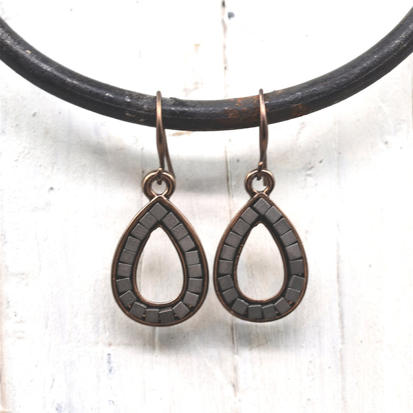 Cutout teardrop with little squares drop earrings