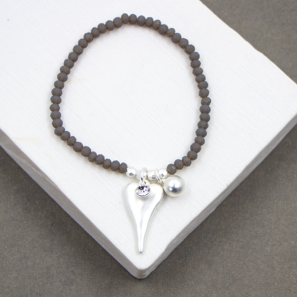 Beaded bracelet with dainty heart & crystal pendant