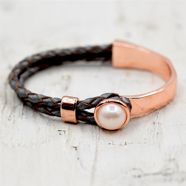 Pearl detail on plaited leather bracelet