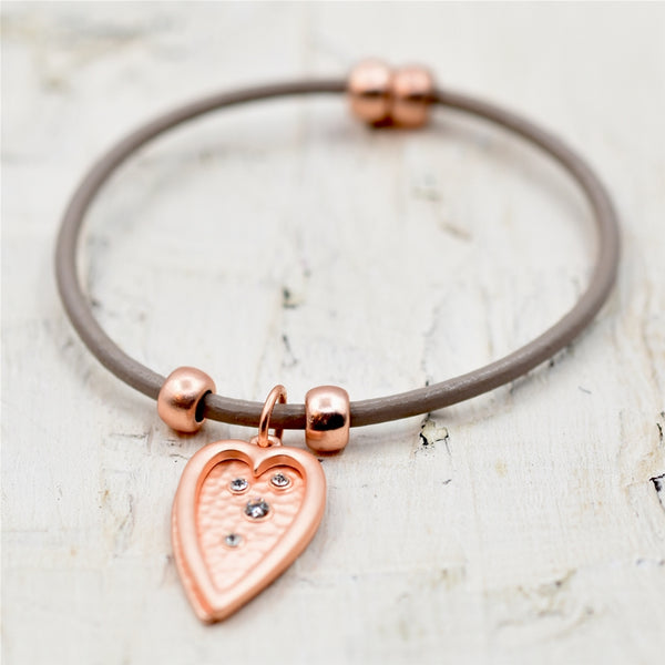 Varied hearts dropper with crystals on slim leather bracelet