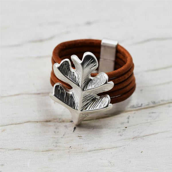 Acorn leaf component on leather ring