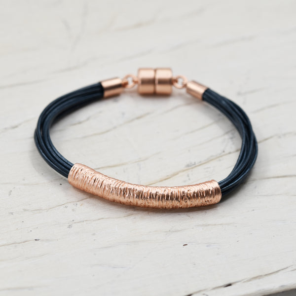 Textured tube component leather bracelet with magnetic clasp