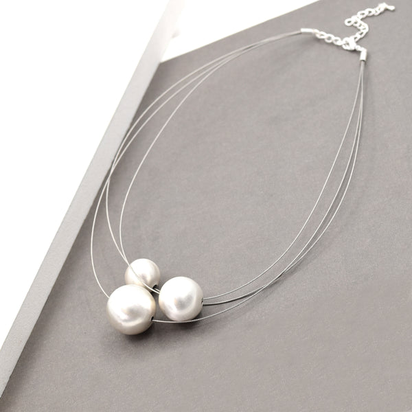 Ball pendant multi strand necklace