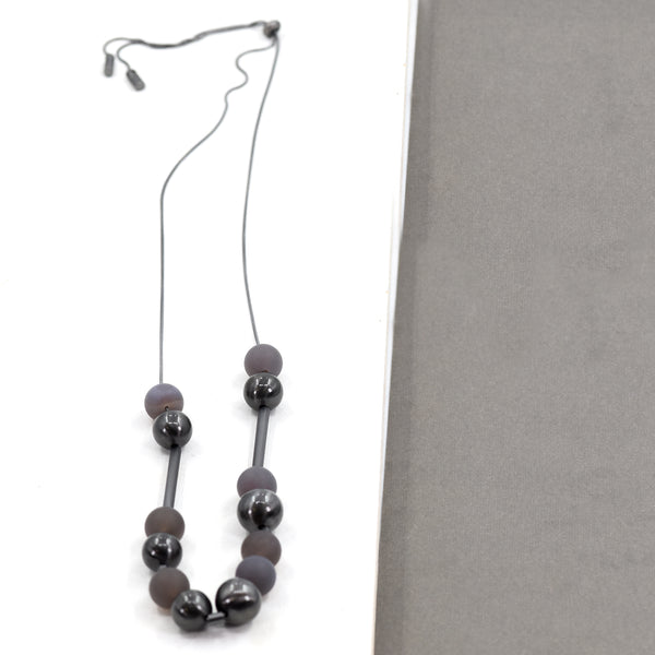 Single strand long necklace with beads