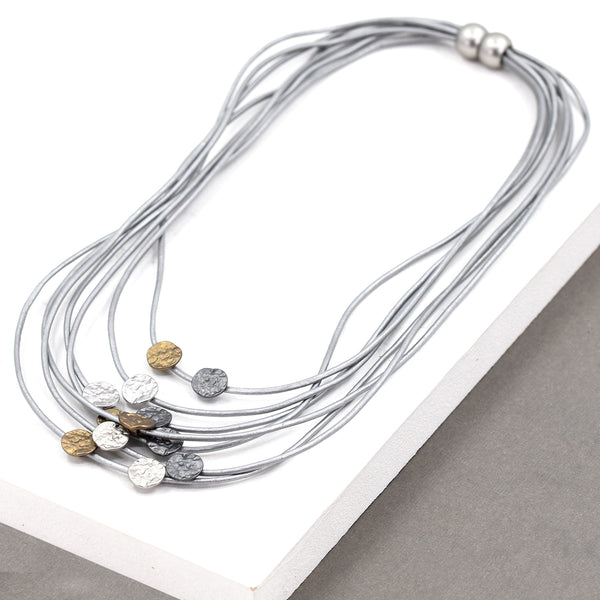 Multi strand short leather necklace with soft hammered discs