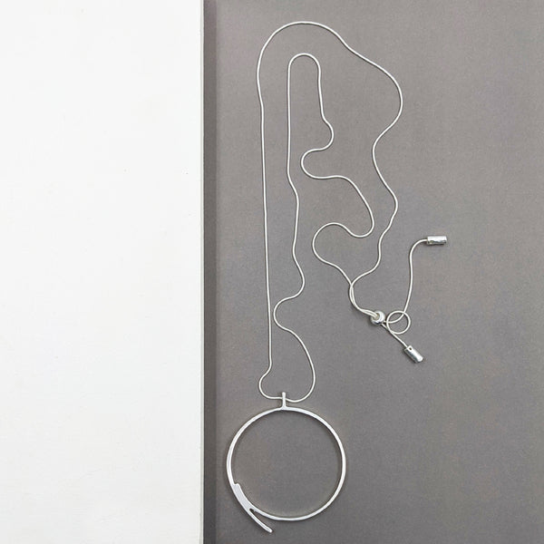 Contemporary ring necklace on long chain